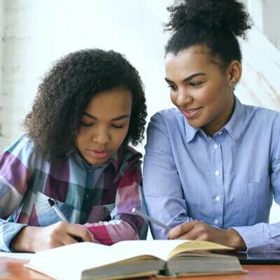woman supporting a student in body doubling