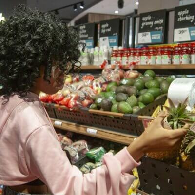 Young girl shopping for herself - support autonomy for autistic individuals?